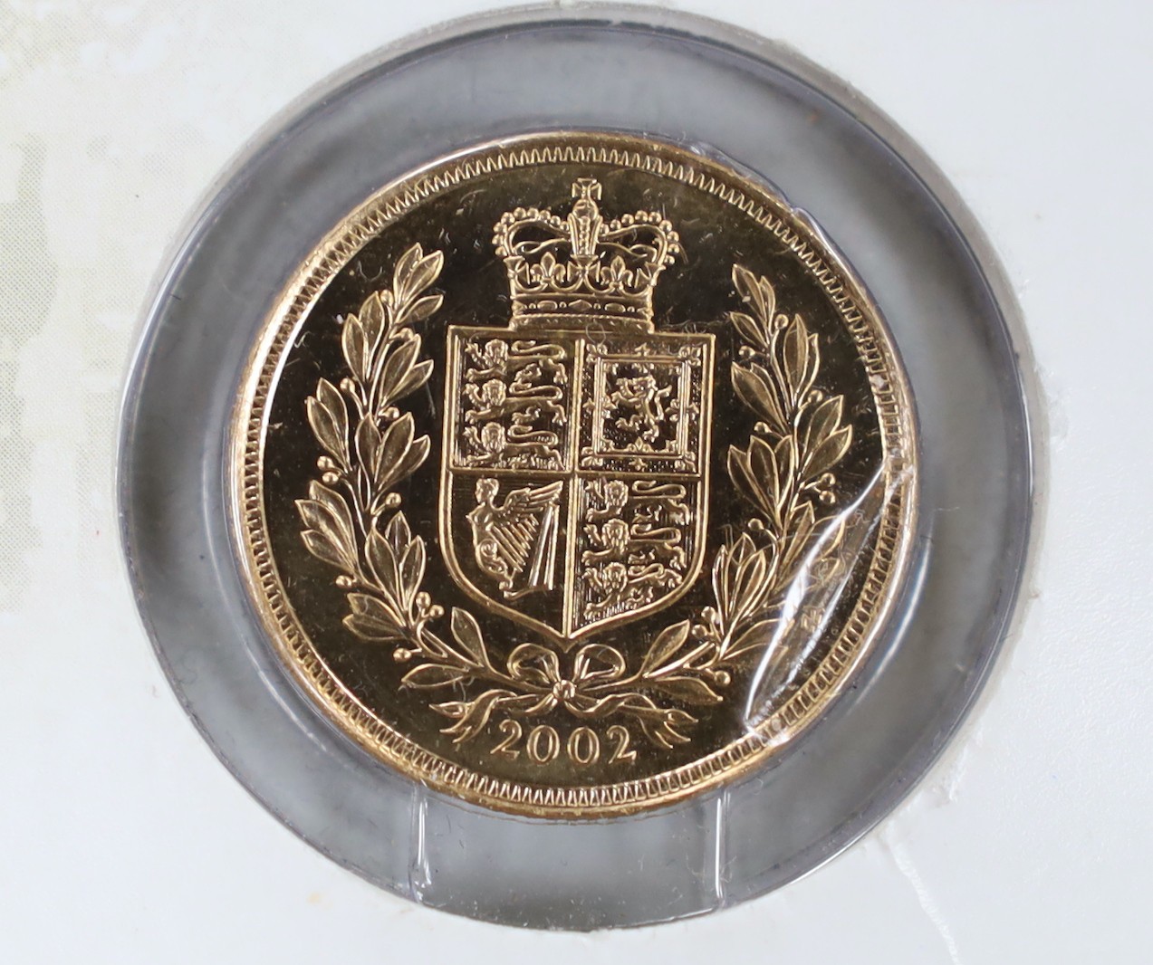 A 2002 limited Royal Mint Collector’s edition gold sovereign.